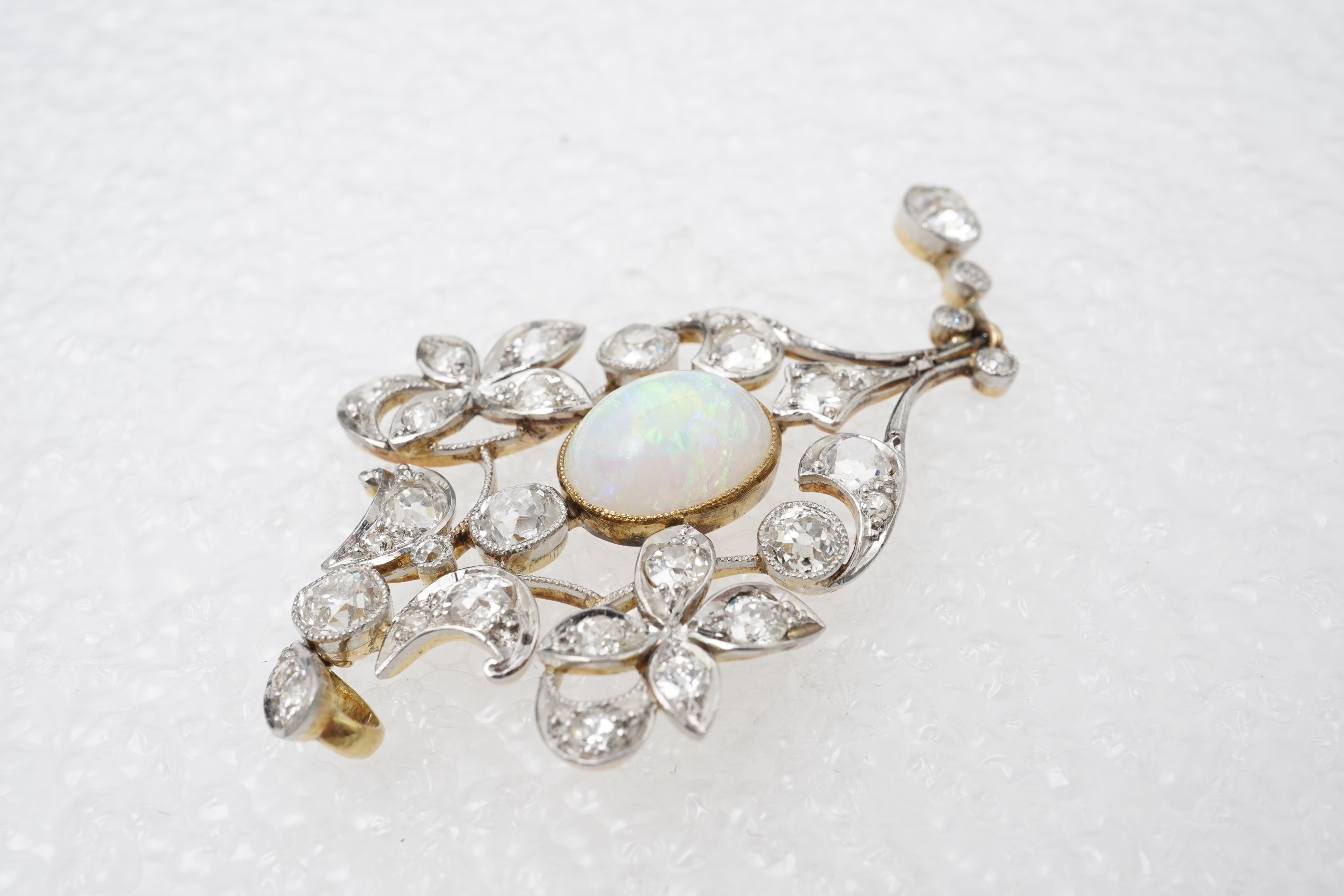 An Edwardian opal and diamond pendant, early 20th century